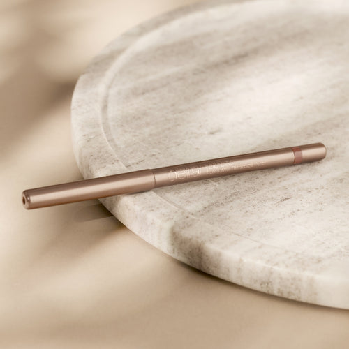 Delilah Lip Line Long Wear Retractable Lip Pencil in the shade Vixen