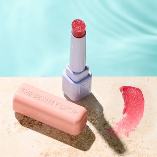 The Beauty Crop Peptide Calm Hydrating and Plumping Melting Lip Balm in the shade Popping Peony