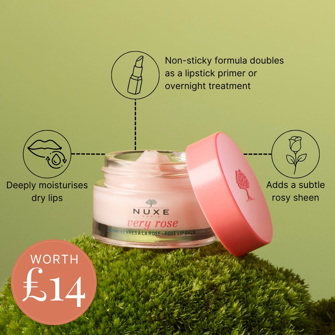 Nuxe Very Rose lip balm jar with its pink lid leaning against it, set on green moss against a light green background with feature callout icons and a 'WORTH £14' badge.